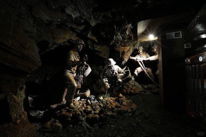 statues of Miners are excavating turquoise